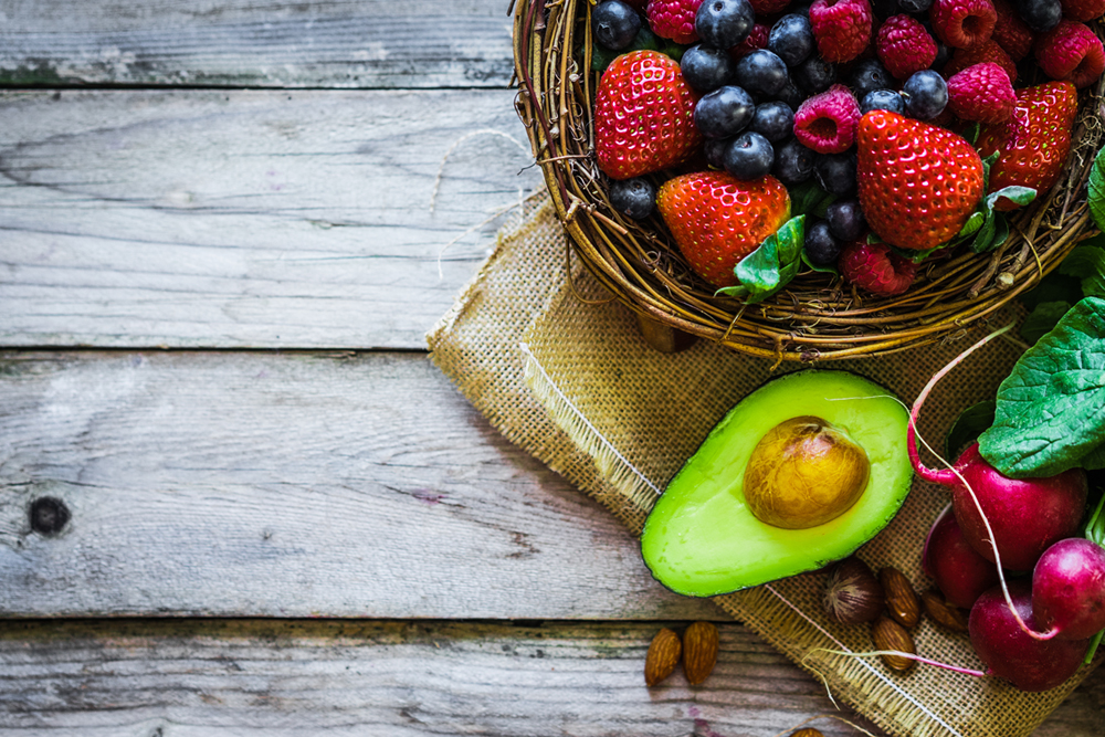 Fruits and vegetables on rustic background